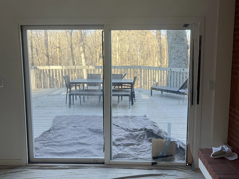 Making sure the floor is protected for this door replacement